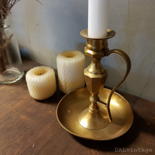 25. Brass candle holder
